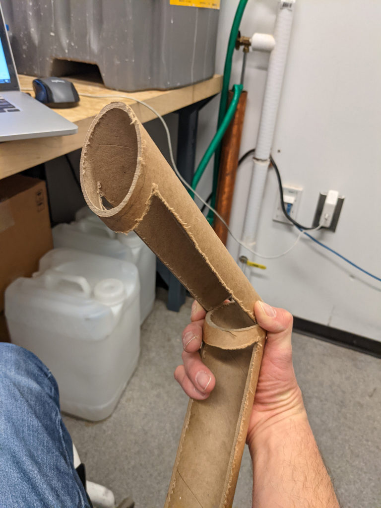 Holding prototype at odd angle to see range of motion possibilities