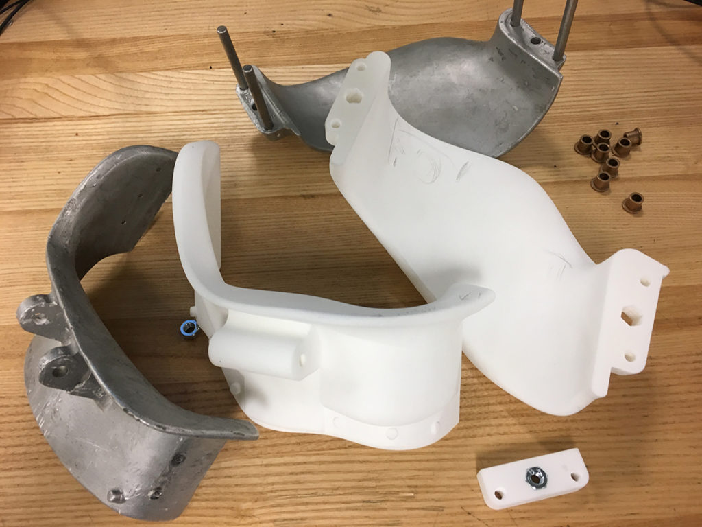 Cast aluminum support and the LS nylon version created from CAD model